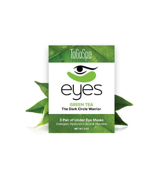 Green and white pack of three pairs of ToGoSpa Eyes Green Tea The Dark Circle Warrior Under Eye Masks flanked by green tea leaves