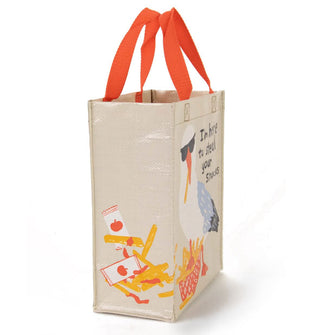 Side view of French fry thief seagull tote features strewn fries and ketchup packets