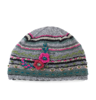 Gray, black, pink, and green striped beanie with a scalloped edge and textural flower and leaf details
