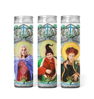Tall glass prayer candle with label illustration depicting Hocus Pocus characters Sarah, Mary, and Winifred Sanderson as saints