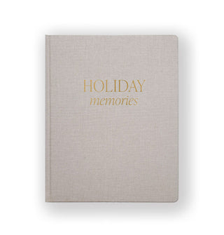 Gray journal cover says, "Holiday memories" in gold foil lettering