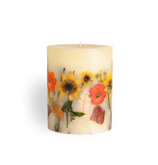 Whitish single-wick pillar candle with inlaid flowers and leaves