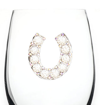 Clear wine glass features a horseshoe adorned with large and small rhinestones