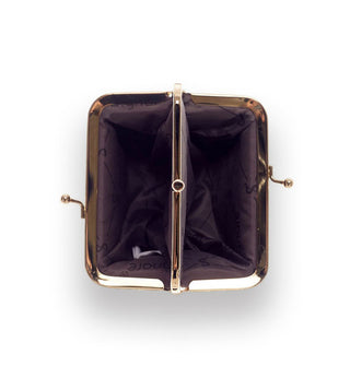 Top view of opened change purse reveals two compartments inside with dark brownish purple nylon lining