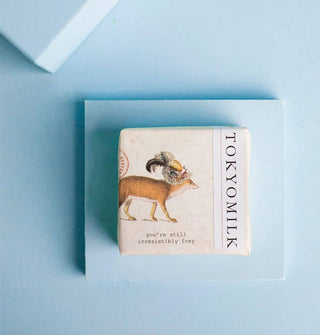 Square bar of wrapped TokyoMilk soap features illustration of a fox in an elaborate hat and the words, "You're still irresistibly foxy"