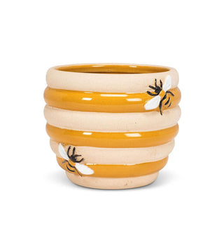 Beehive-shaped ceramic planter with alternating matte beige and glossy yellow ribs accented with embossed painted bees