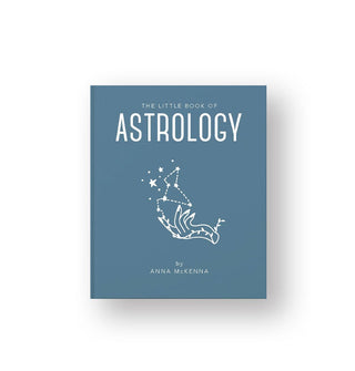 Blue cover of The Little Book of Astrology features a central illustration of vine-wrapped hand touching the tip of a constellation under white title lettering