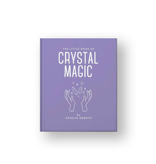 Purple cover of The Little Book of Crystal Magic by Katalin Nemeth features a central illustration of two hands between which two crystals and stars are floating