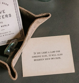 Sample note from The Little Book of Love Letters to the World: 150 Messages to Brighten & Enlighten reads, "If you light a lamp for someone else, it will also brighten your own path."
