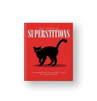 Red cover of The Little Book of Superstitions: A Celebration of Superstitious Wit and Wisdom features white lettering and an illustration of a black cat