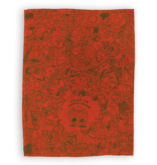Reddish-orange dish towel features whimsical illustrations in the midst of which is a wide-eyed tomato appearing to gaze up at the words, "Living for tomato season."