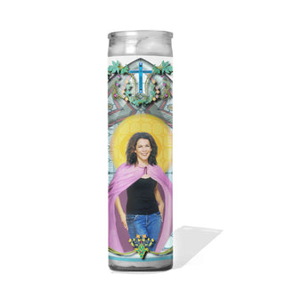 Tall glass prayer candle with colorful label depicting Lauren Graham's Gilmore Girls character Lorelai Gilmore as a saint