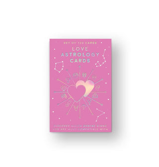 Pink box of Love Astrology Cards with holographic foil lettering and celestial designs