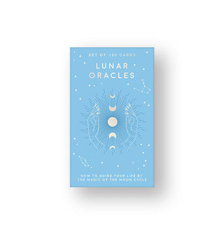 Light blue box of Lunar Oracles cards features central white illustration of two hands cupped around phases of the moon with dark blue radial accents