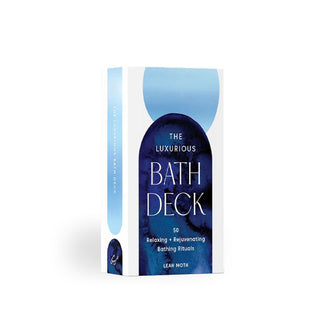 The Luxurious Bath Deck card box with rounded blue geometric design accents and white lettering