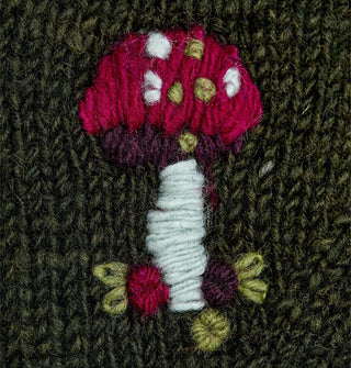 Closeup of mushroom yarn embroidery detail
