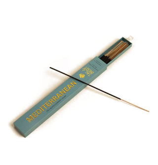 Blue-green slide box of Mediterranean incense sticks with white ribbon pull and gold lettering