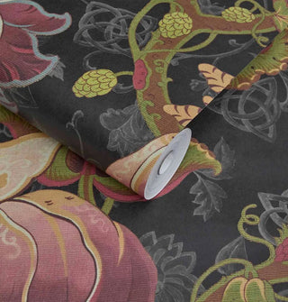Roll and sheet of black wallpaper with floral pattern and Celtic symbols