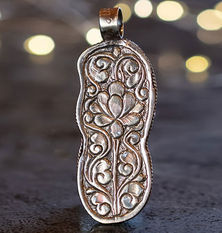 Ornate floral engraved silver necklace pendant
