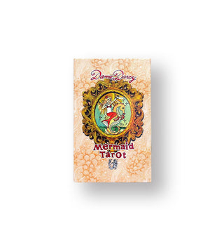 Pack of Dame Darcy Mermaid Tarot cards in decorative box with central illustration of a mermaid riding a seahorse inside an ornate gold frame