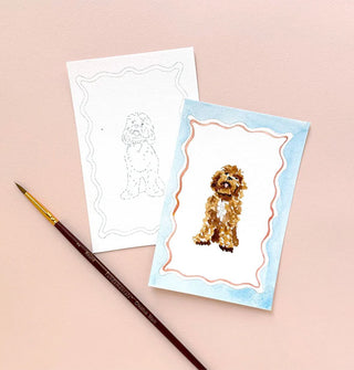 One completed and one sketch-only dog portrait with paintbrush