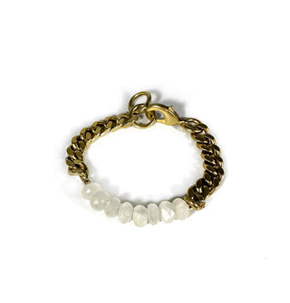 Eight whitish rounded faceted moonstones on a chunky brass curb chain bracelet with lobster clasp