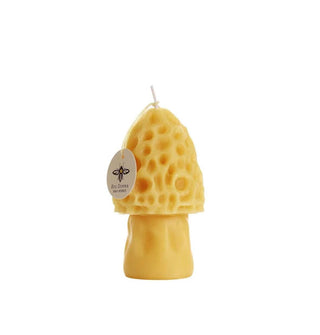 Golden beeswax candle shaped as a morel mushroom with small round tag hanging from its cotton wick