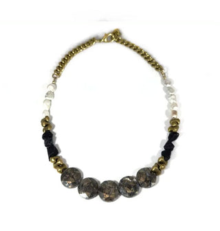 Flecked marcasite, white freshwater pearl, and black spinel stones are strung with brass accent beads on a chunky brass curb chain with lobster clasp