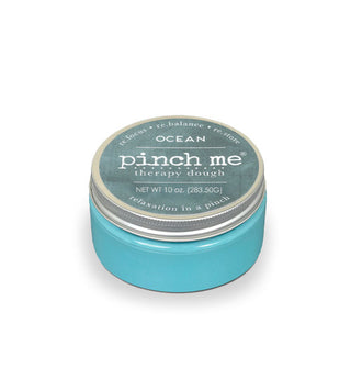 Blue 10-ounce pot of Ocean scent Pinch Me Therapy Dough with white lettering