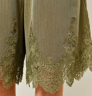 Olive green shorts with lace hem detail