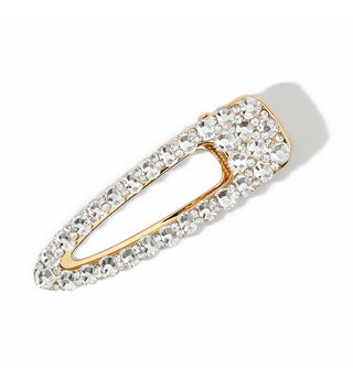 Gold hair clip with open shape is covered in clear rhinestones