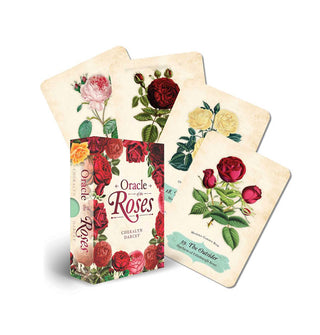 Box and four-card spread of Oracle of the Roses cards, all featuring colorful, vintage-style botanical illustrations
