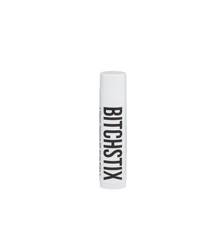 White tube of Bitchstix lip balm with large black lettering