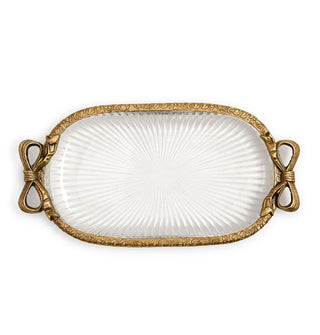 Oval-shaped ribbed glass dish with brass rim featuring bow accents on either side