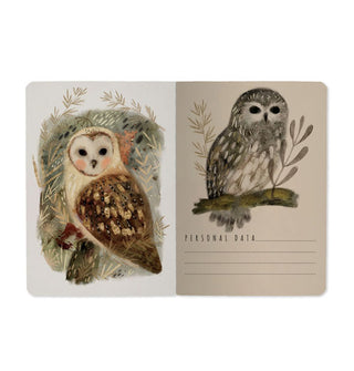 Notebook interior features a small lined section for personal data alongside two large owl illustrations