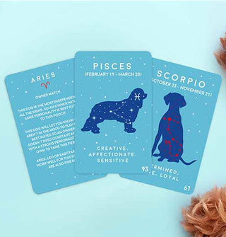 Spread of three Paw-Mistry Dog Edition cards with illustrations for Aries, Pisces, and Scorpio