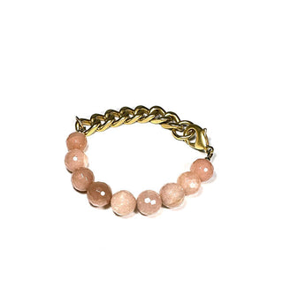 Bracelet of faceted round peach-colored moonstone beads with brass curb chain and lobster claw