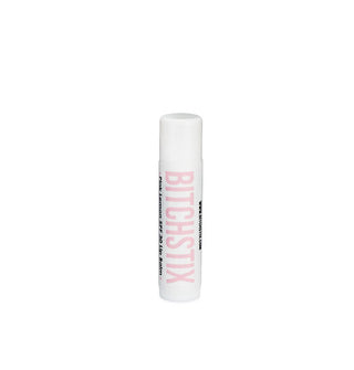 White tube of Bitchstix lip balm with large pale pink lettering