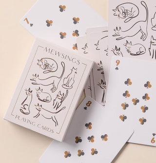 Box and assortment of playing cards from the Mewsings cats deck