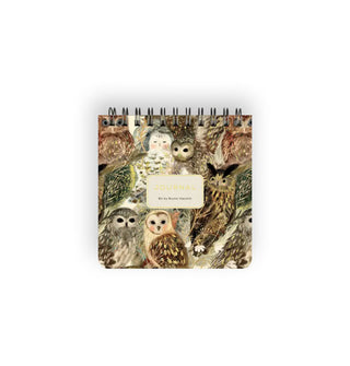 Small square spiral-bound notebook cover features owl illustrations in muted tones
