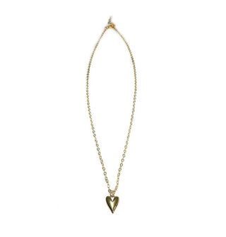 Gold heart pendant on gold chain necklace