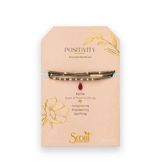 Pyrite beaded Positivity Bracelet/Necklace with central teardrop stone wrapped three times around a gold foil detailed product card