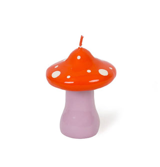 Mushroom candle with purple base and red cap with white spots