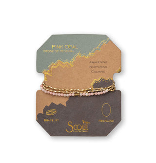 Pink opal and gold beaded bracelet/necklace wrapped around product card with gold foil design details