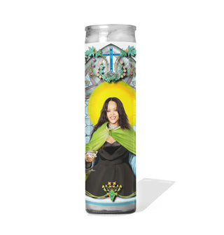Tall glass prayer candle with colorful label depicting Rihanna as a saint