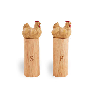 Pair of wooden salt and pepper grinders feature engraved rooster toppers with red wattles and combs, and "S" and "P" marked on the bases