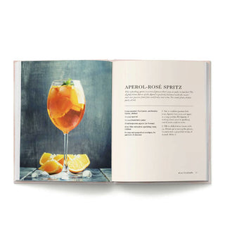 Page spread from Rosé Cocktails features a recipe for an Aperol-Rosé Spritz alongside a staged photograph of the drink