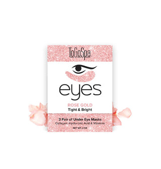 White and sparkly pink packet of 3 pairs of ToGoSpa Eyes Rose Gold Tight & Bright Under Eye Masks flanked by pink rose petals