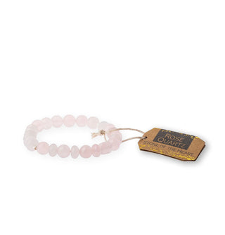 Rose quartz stone bead bracelet with brown tag attached