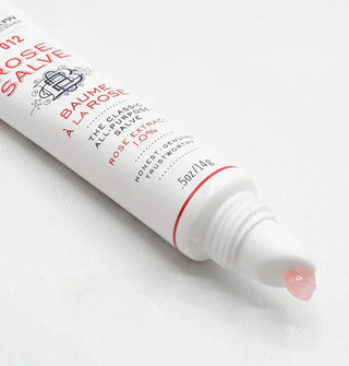 Opened tube of Rose Salve dispenses a small glob of transparent pink product